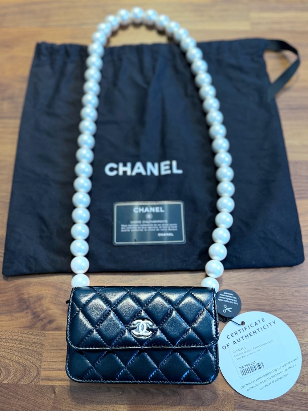 CHANEL Black Quilted Leather
Card Holder with Pearl Strap **PRISTINE**
